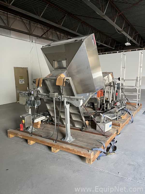 Ronchi Mario spa Elevator and Nordson PROblue 4 Gluer