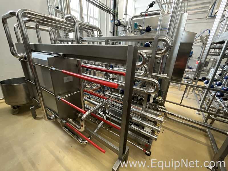 A Due Integrated Processing System - Juice and Syrup Mixing with Flash Pasteurisation at 8,000 LPH