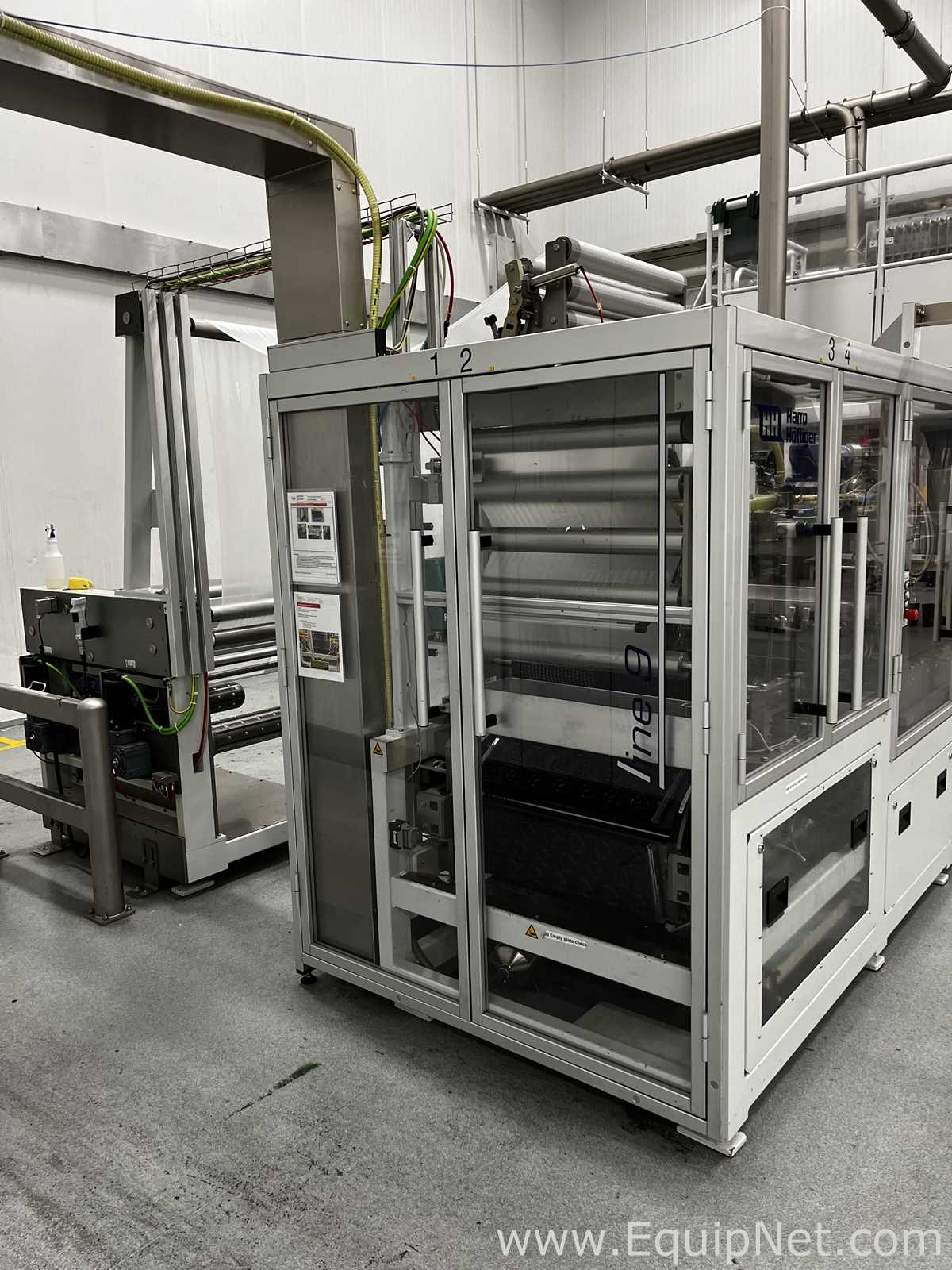 Two Harro Hofliger Continuous Pod and Disc Filling and Packaging Lines