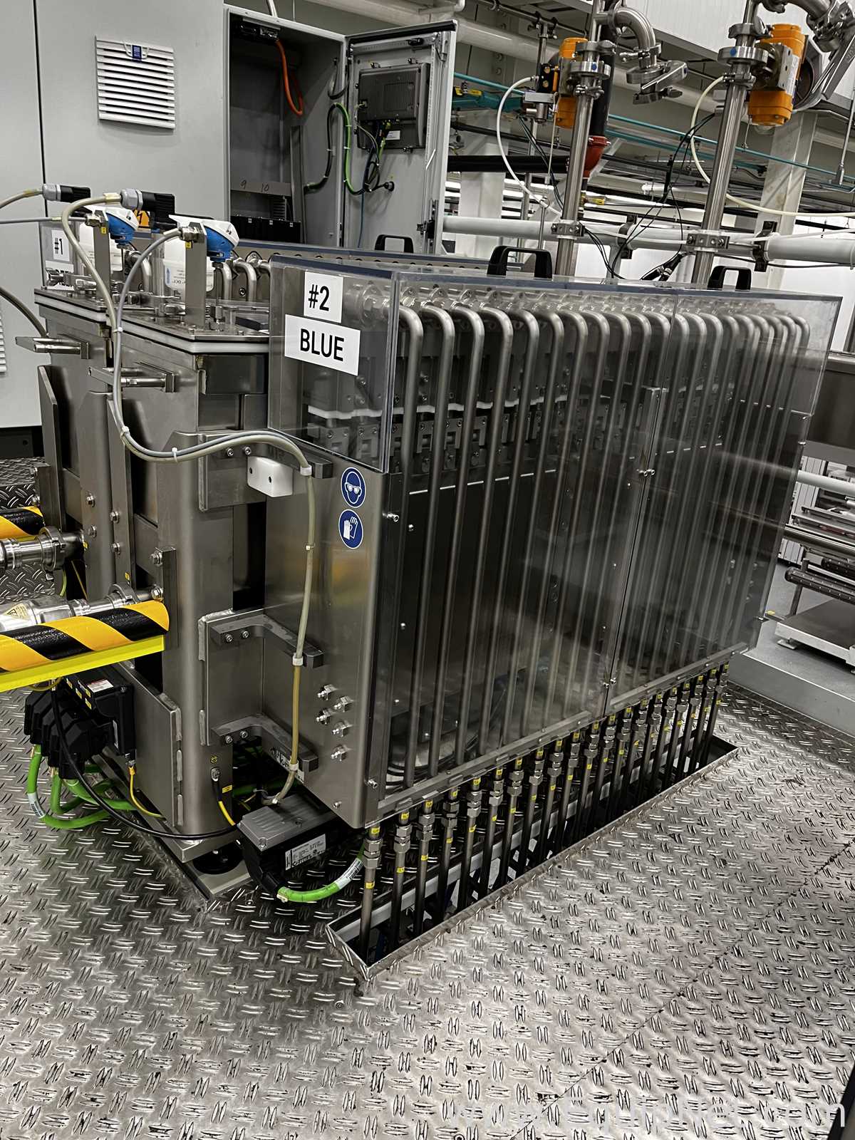 Two Harro Hofliger Continuous Pod and Disc Filling and Packaging Lines