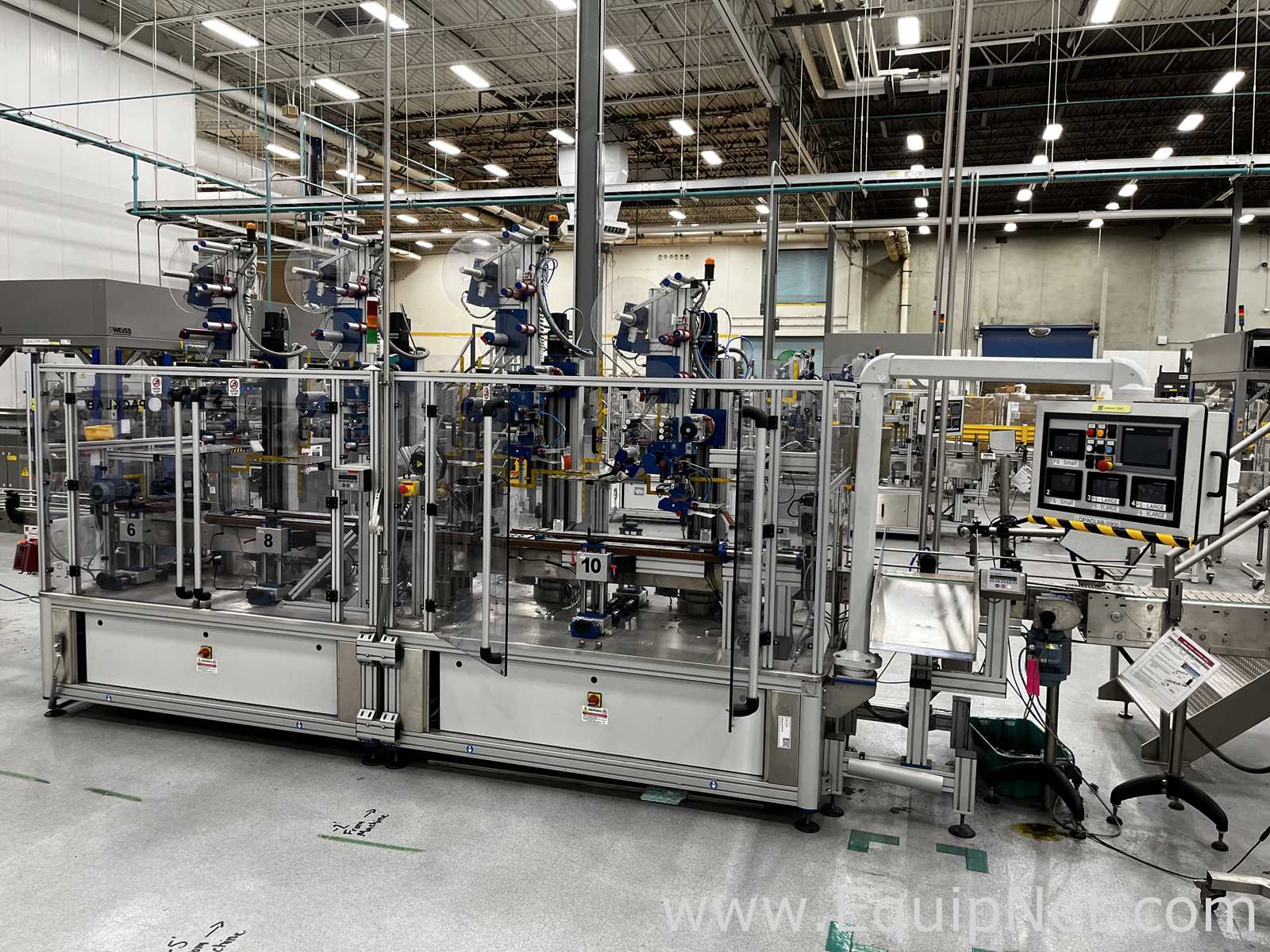 Two Harro Hofliger Continuous Pod and Disc Filling and Packaging Lines