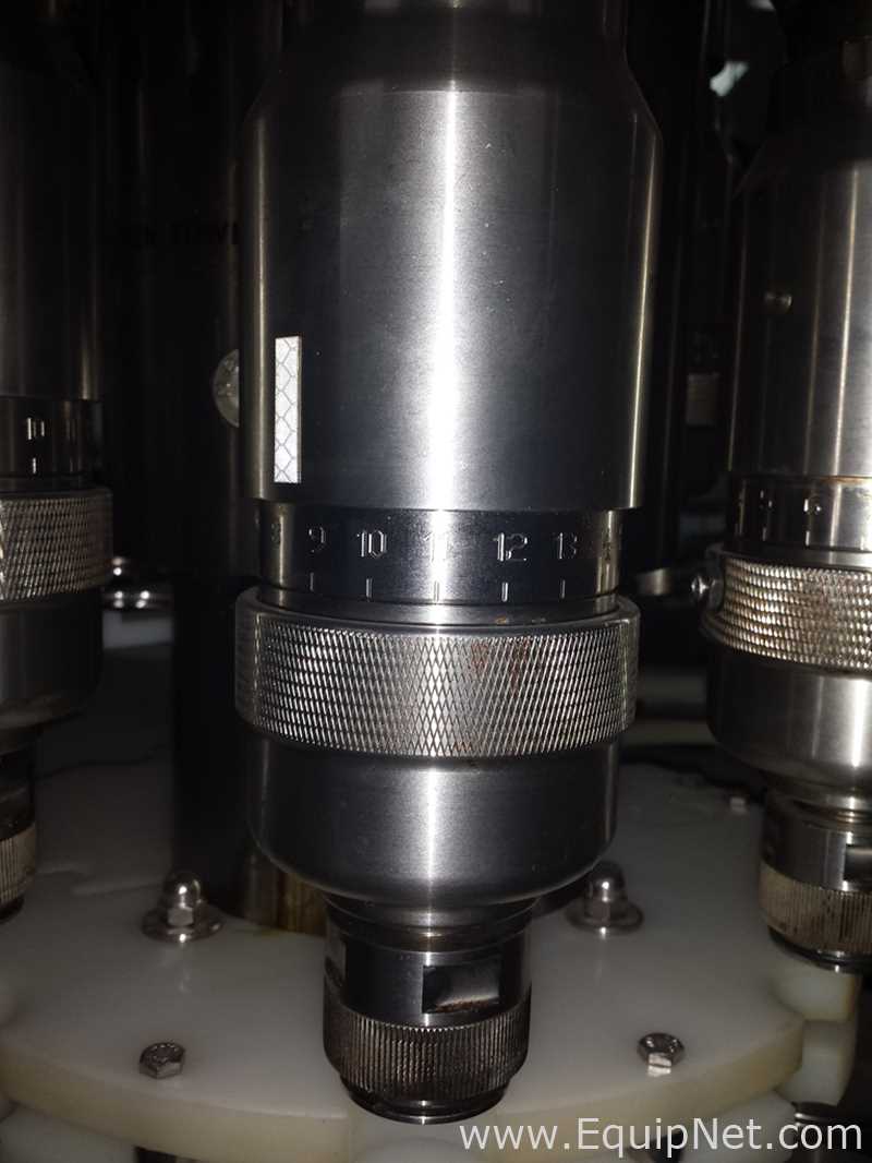 Used Borgo 8 head rotary capper model V8-T with centrifugal bowl and cap elevator