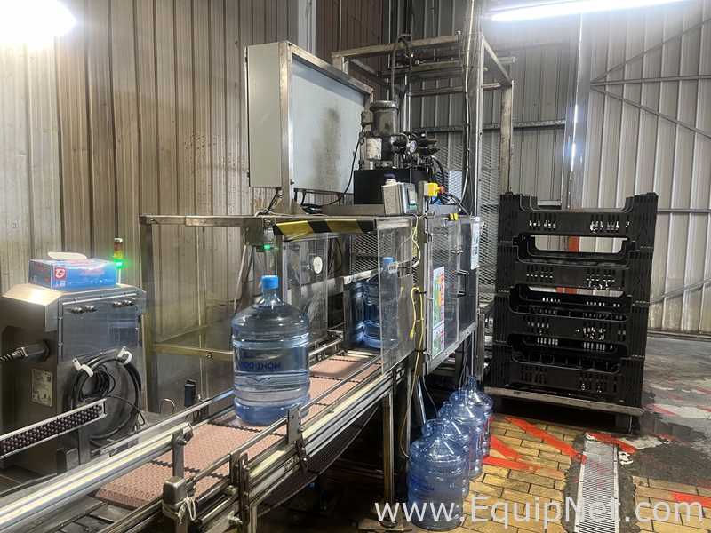 Linha de Envase de Bebidas Cap Snap 300 Metric Adapta.  5 Galão