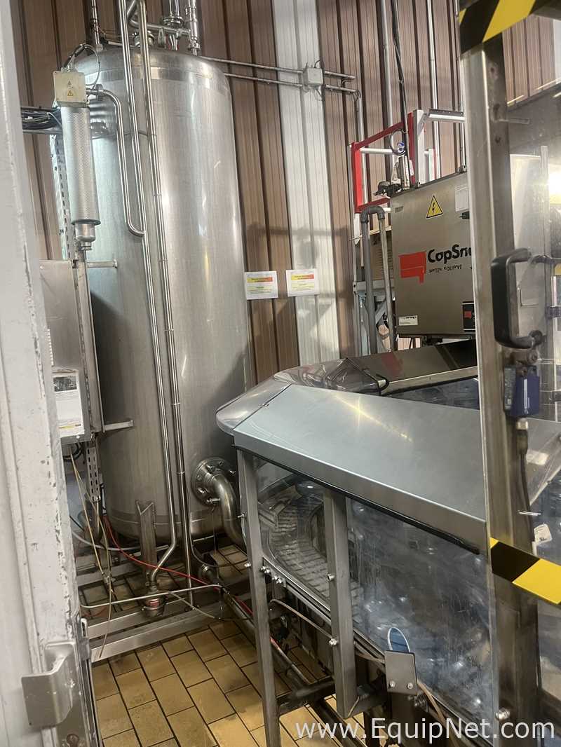Linha de Envase de Bebidas Cap Snap 300 Metric Adapta.  5 Galão