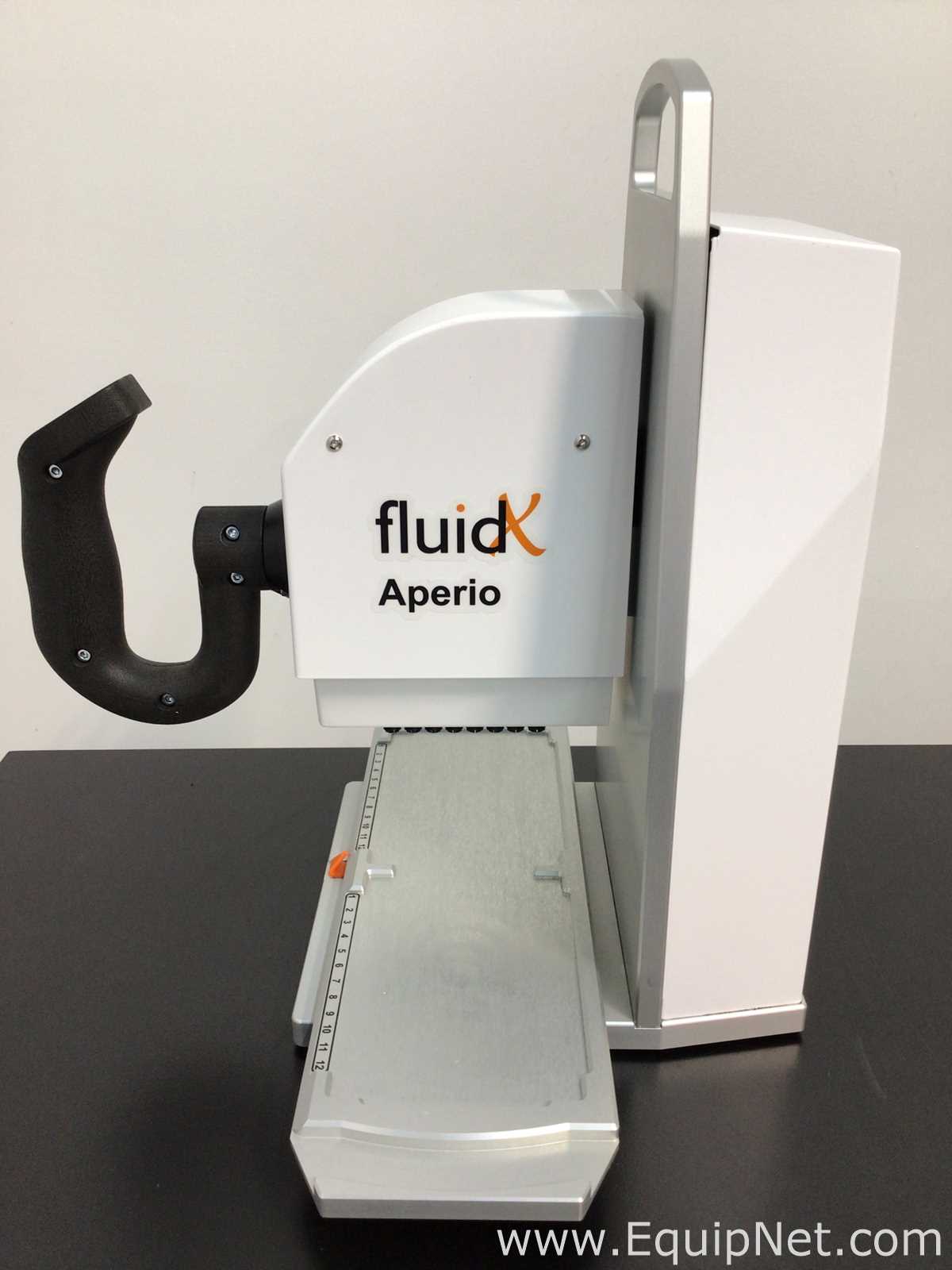 Tampadora FluidX Aperio