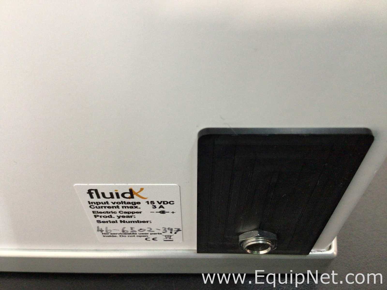 Tampadora FluidX Aperio