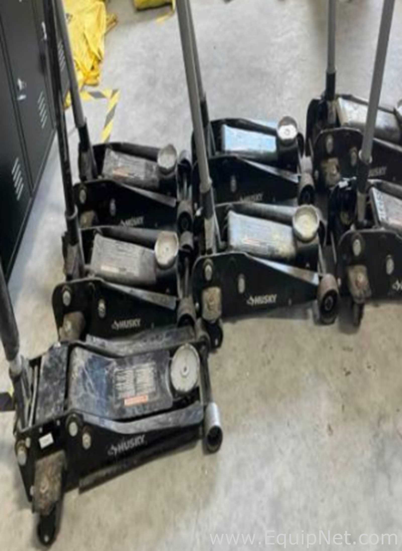 Approximately 6 Husky 3-Ton Hydraulic Garage Jacks