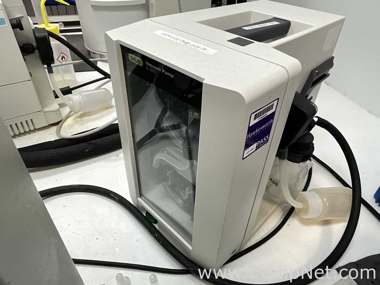 Buchi R-100 Rotary Evaporator with B-100 Heating Bath and V-300 Vacuum Pump