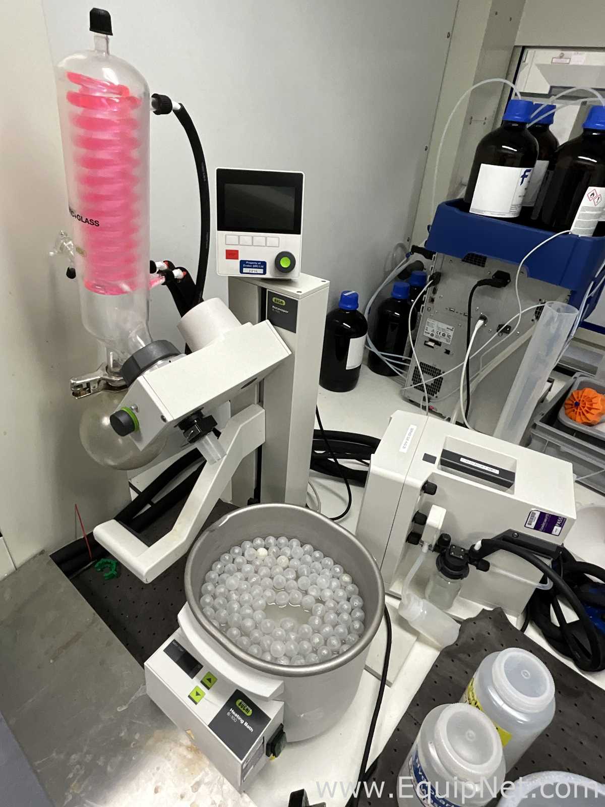 Buchi R-100 Rotary Evaporator with B-100 Heating Bath and V-300 Vacuum Pump