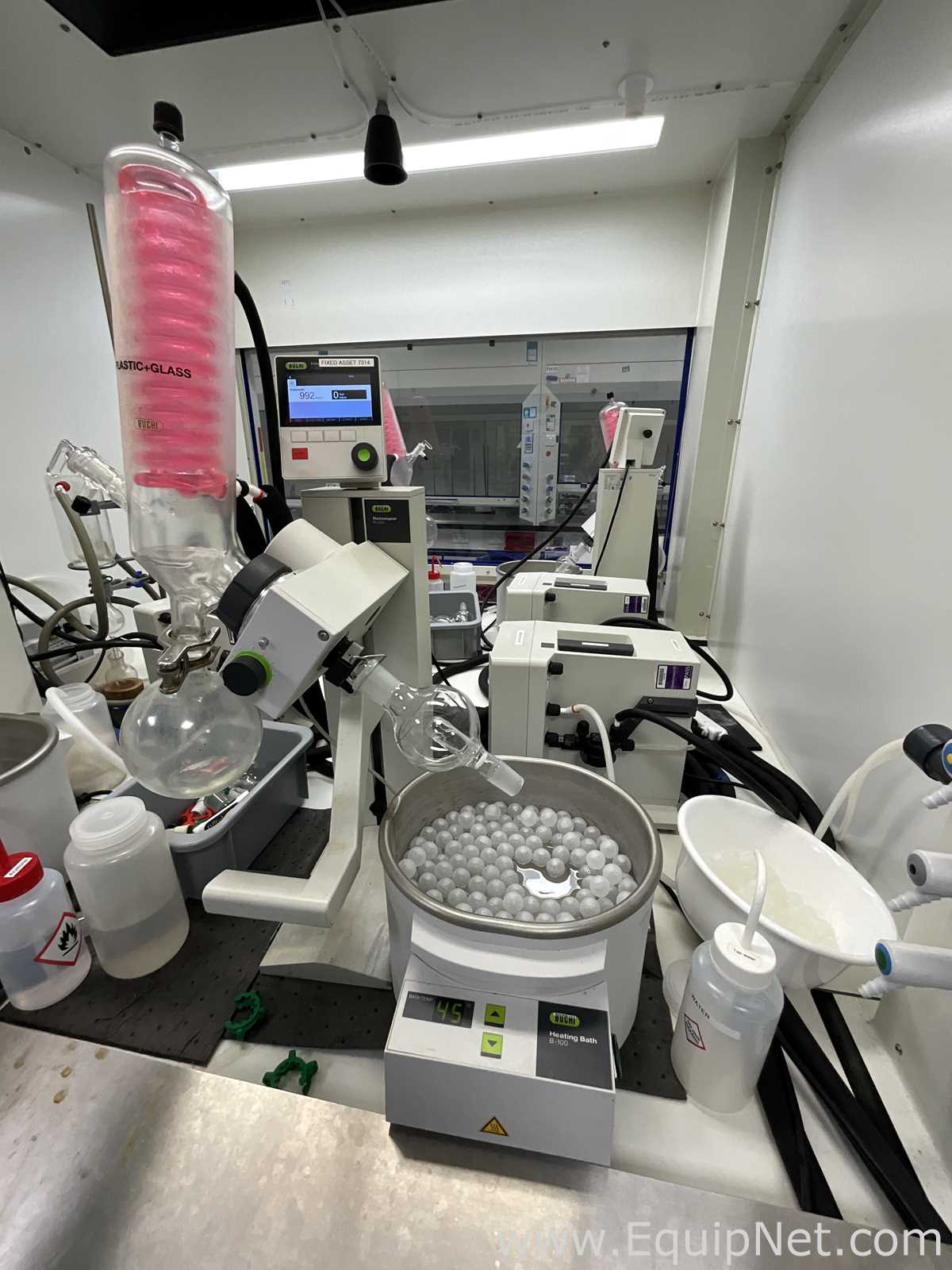 Buchi R-100 Rotary Evaporator with B-100 Heating Bath, V-300 Vacuum Pump and F-314 Recirc Chiller