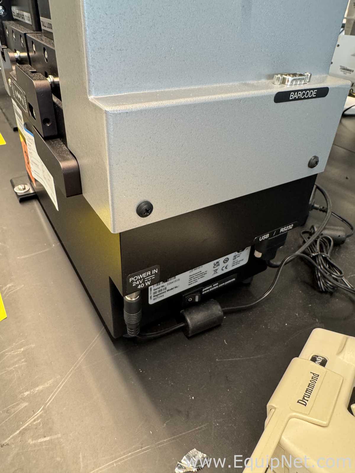 BioTek Instruments 405TSUVS Microplate Washer With Vacuum Pump And BioStack 4 Microplate Stacker