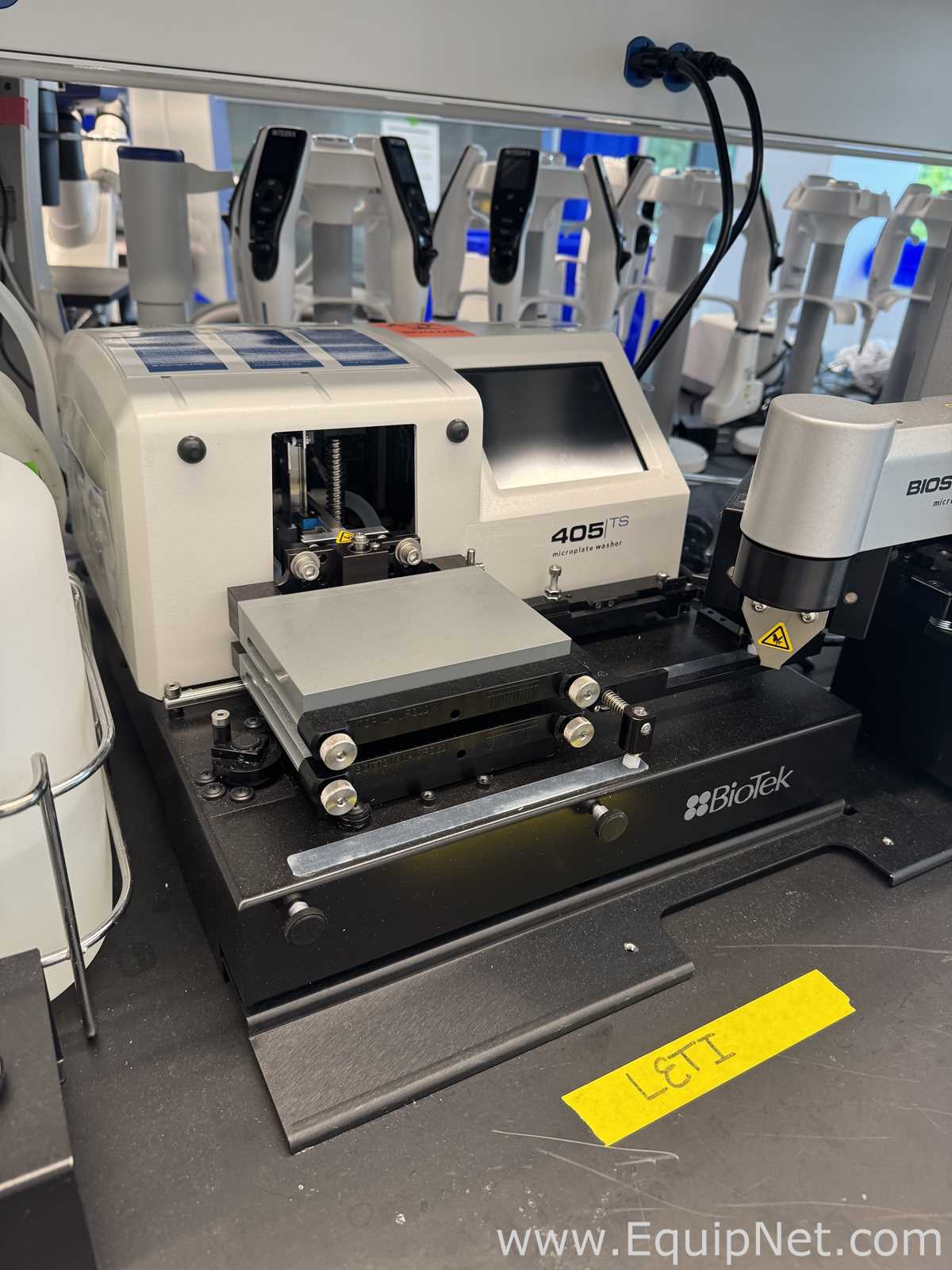 BioTek Instruments 405TSUVS Microplate Washer With Vacuum Pump And BioStack 4 Microplate Stacker