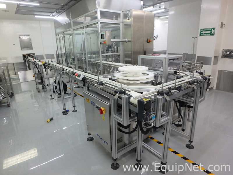 Maquina Monobloque de Llenado-Tapado de Frasco marcaRomacoMacofar modeloLVI4 con Equipos Perifericos