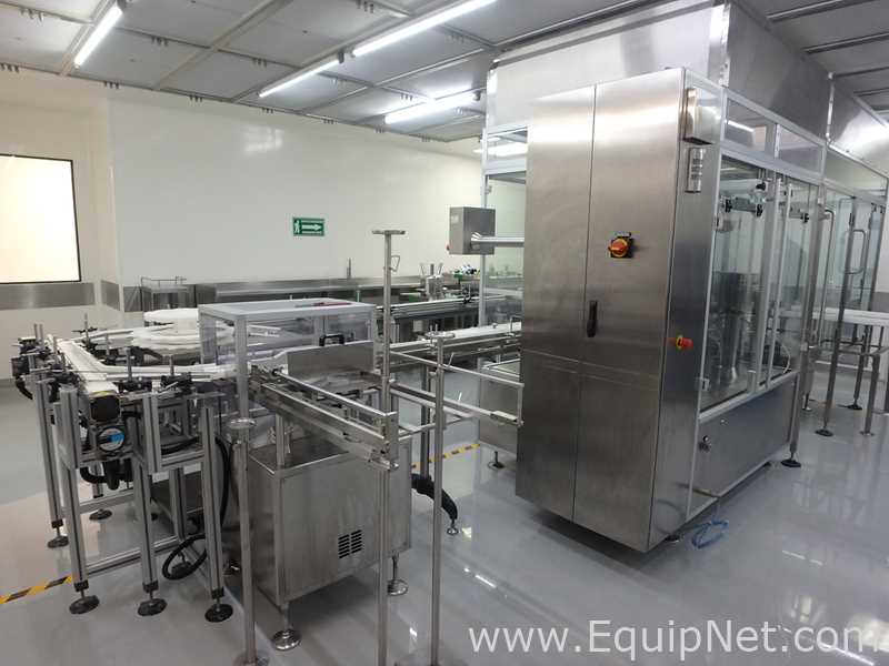 Maquina Monobloque de Llenado-Tapado de Frasco marcaRomacoMacofar modeloLVI4 con Equipos Perifericos