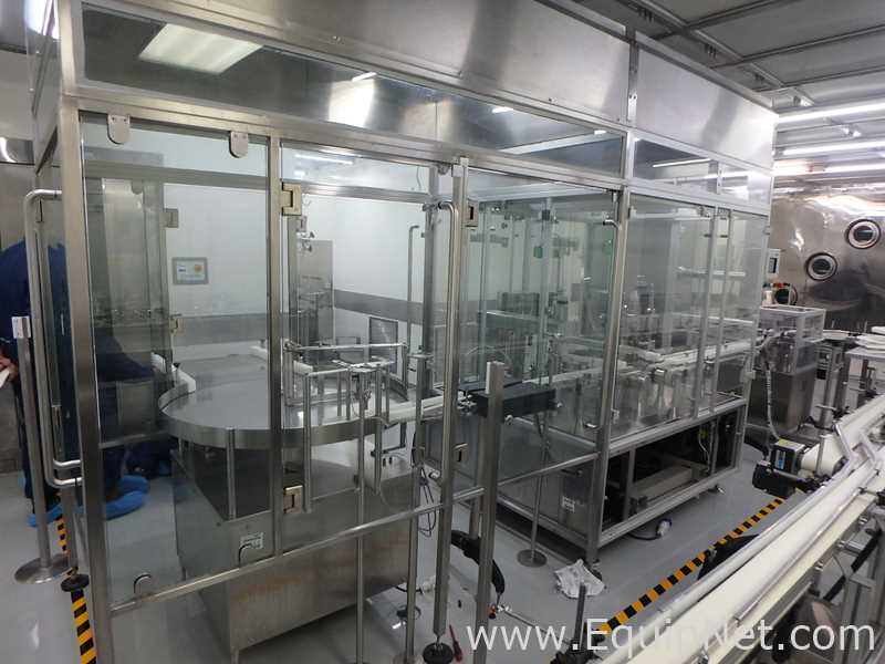 Maquina Monobloque de Llenado-Tapado de Frasco marcaRomacoMacofar modeloLVI4 con Equipos Perifericos