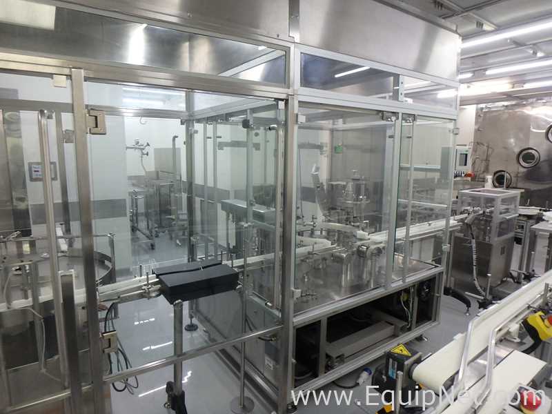 Maquina Monobloque de Llenado-Tapado de Frasco marcaRomacoMacofar modeloLVI4 con Equipos Perifericos