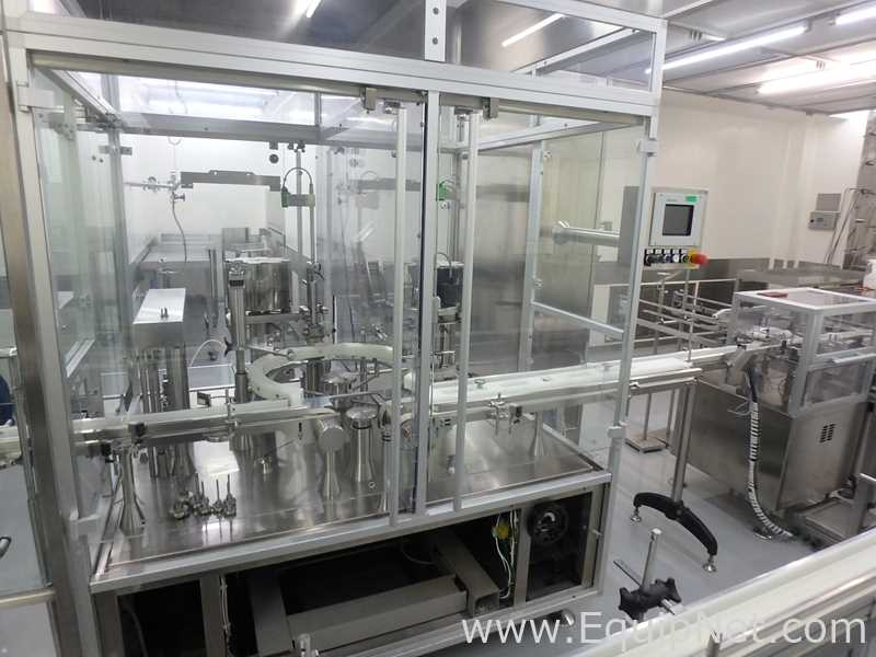 Maquina Monobloque de Llenado-Tapado de Frasco marcaRomacoMacofar modeloLVI4 con Equipos Perifericos