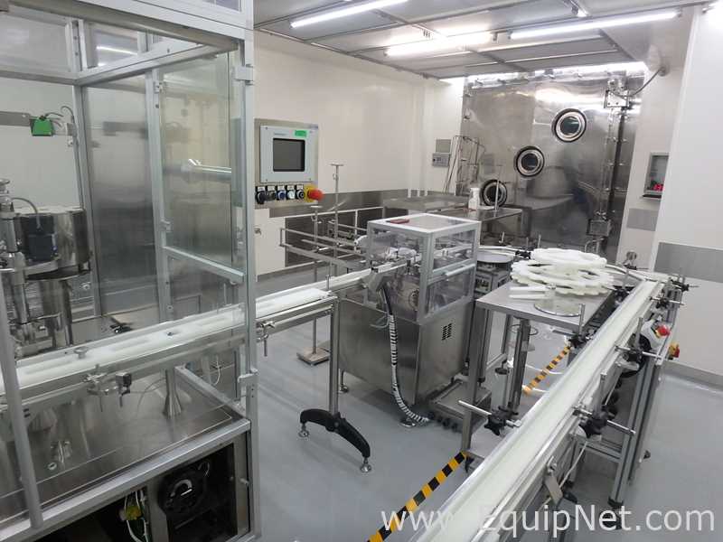 Maquina Monobloque de Llenado-Tapado de Frasco marcaRomacoMacofar modeloLVI4 con Equipos Perifericos
