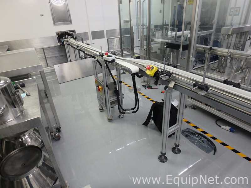 Maquina Monobloque de Llenado-Tapado de Frasco marcaRomacoMacofar modeloLVI4 con Equipos Perifericos
