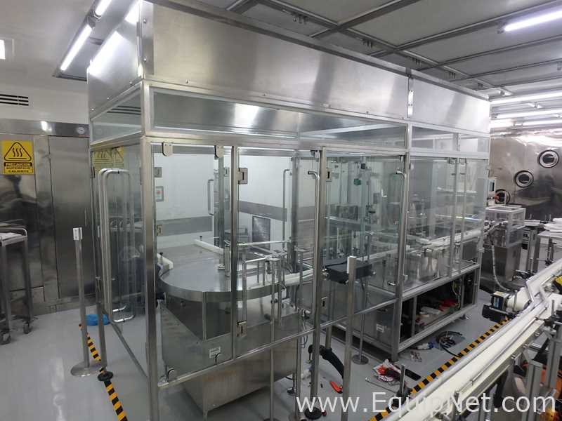 Maquina Monobloque de Llenado-Tapado de Frasco marcaRomacoMacofar modeloLVI4 con Equipos Perifericos