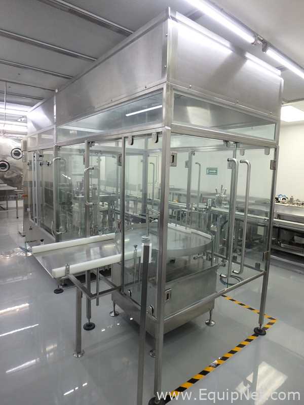 Maquina Monobloque de Llenado-Tapado de Frasco marcaRomacoMacofar modeloLVI4 con Equipos Perifericos