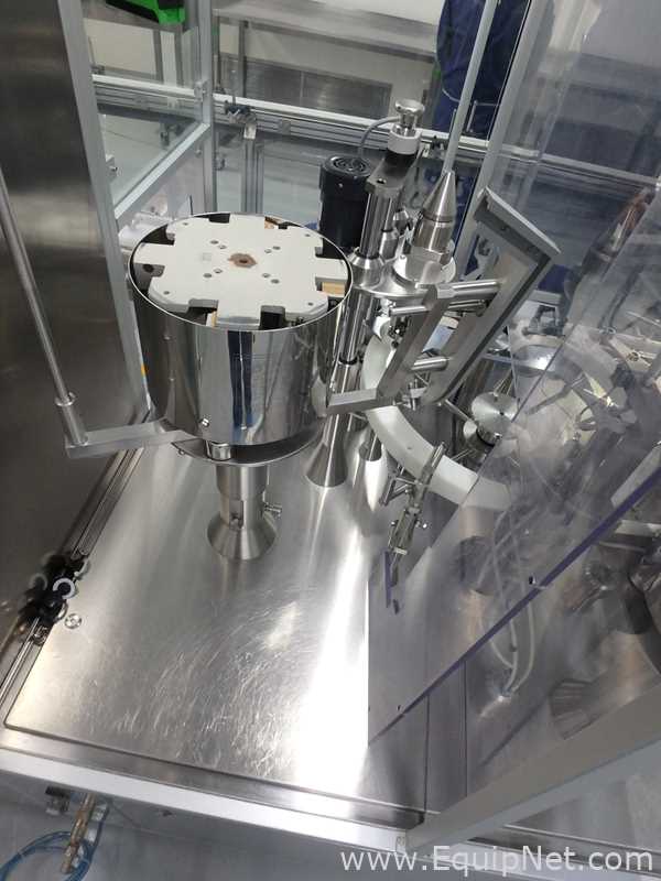 Maquina Monobloque de Llenado-Tapado de Frasco marcaRomacoMacofar modeloLVI4 con Equipos Perifericos