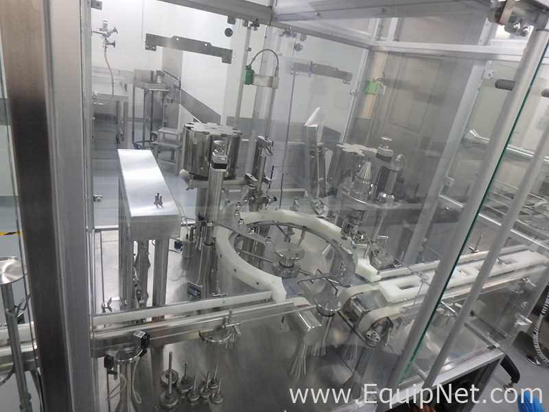 Maquina Monobloque de Llenado-Tapado de Frasco marcaRomacoMacofar modeloLVI4 con Equipos Perifericos