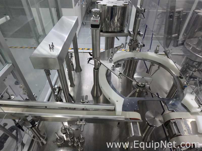 Maquina Monobloque de Llenado-Tapado de Frasco marcaRomacoMacofar modeloLVI4 con Equipos Perifericos