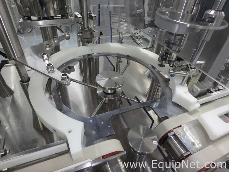 Maquina Monobloque de Llenado-Tapado de Frasco marcaRomacoMacofar modeloLVI4 con Equipos Perifericos