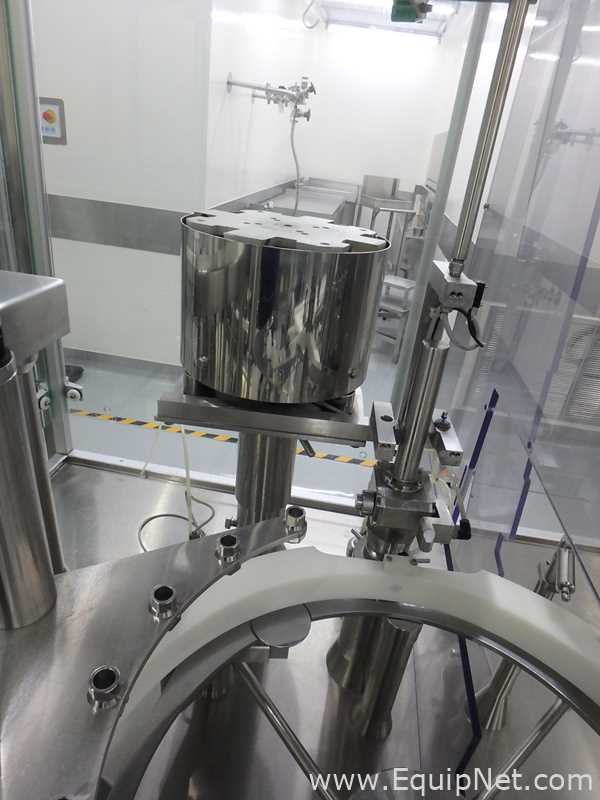 Maquina Monobloque de Llenado-Tapado de Frasco marcaRomacoMacofar modeloLVI4 con Equipos Perifericos