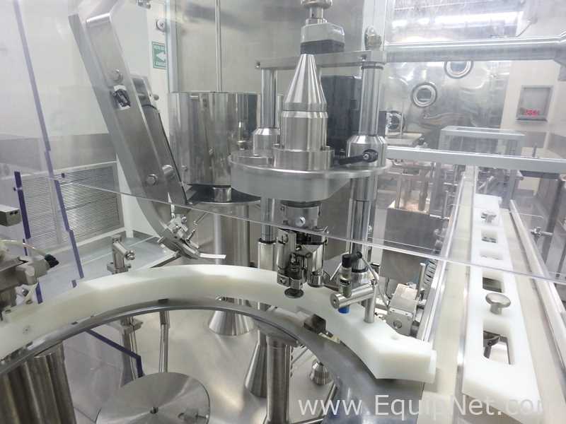 Maquina Monobloque de Llenado-Tapado de Frasco marcaRomacoMacofar modeloLVI4 con Equipos Perifericos