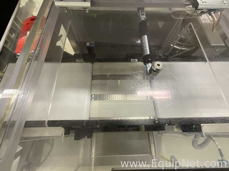 OCS Checkweighers GmbH HC Check Weigher and Reject Station - Syrup Line 4 Packaging