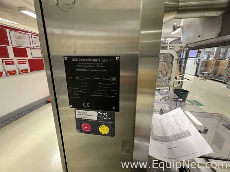 OCS Checkweighers GmbH HC Check Weigher and Reject Station - Syrup Line 4 Packaging