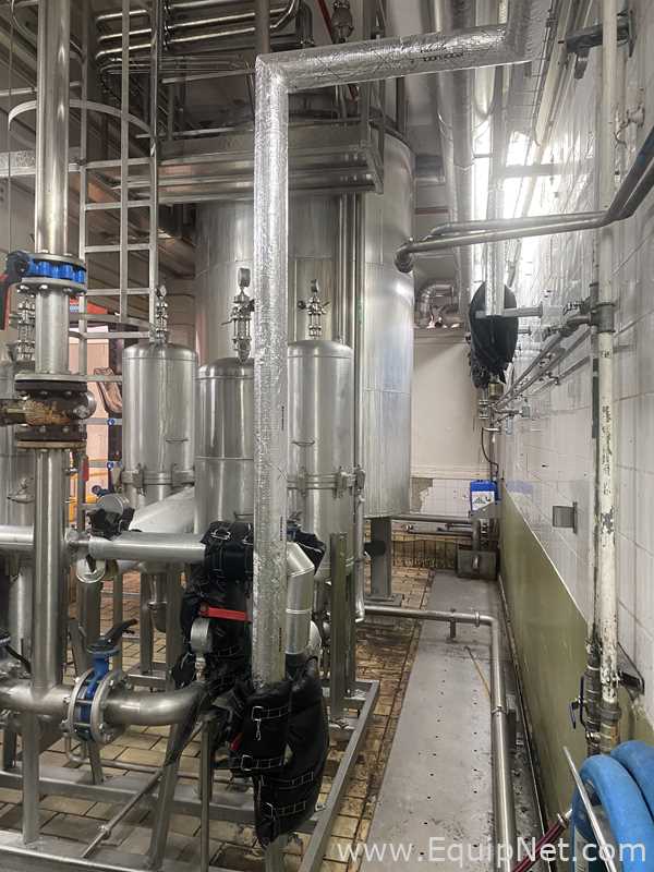 Vertical Tank with Filter Products Europe Filter Skid
