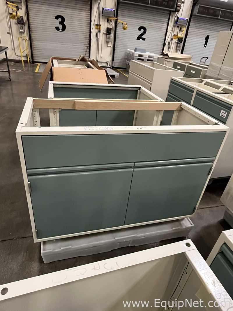 Lot of Lab Storage Counters and Cabinets, Agave and Light Neutral Colors and one pump