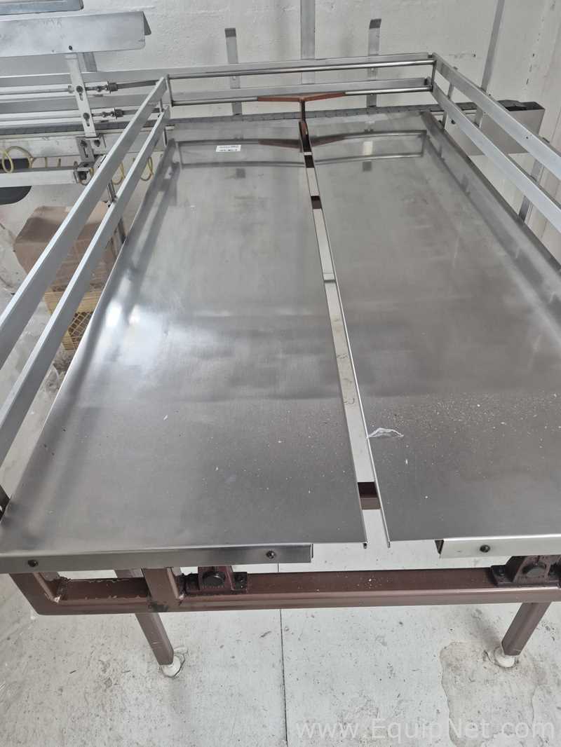 Mesa Acumuladora de Fluxo Duplo Autopack, Ltd. 