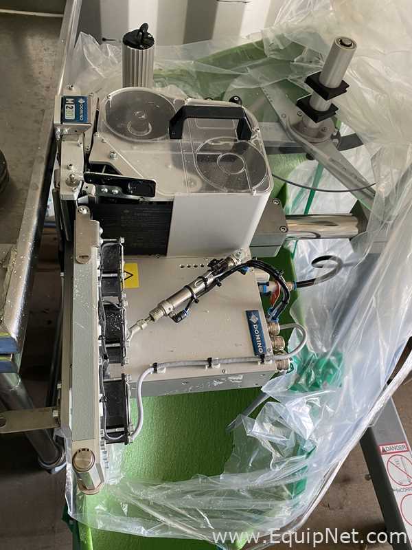 Domino M230i-WR100-90-110x300-LEFT Print and Apply Labeler