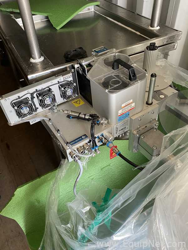 Domino M230i-WR100-90-110x300-LEFT Print and Apply Labeler
