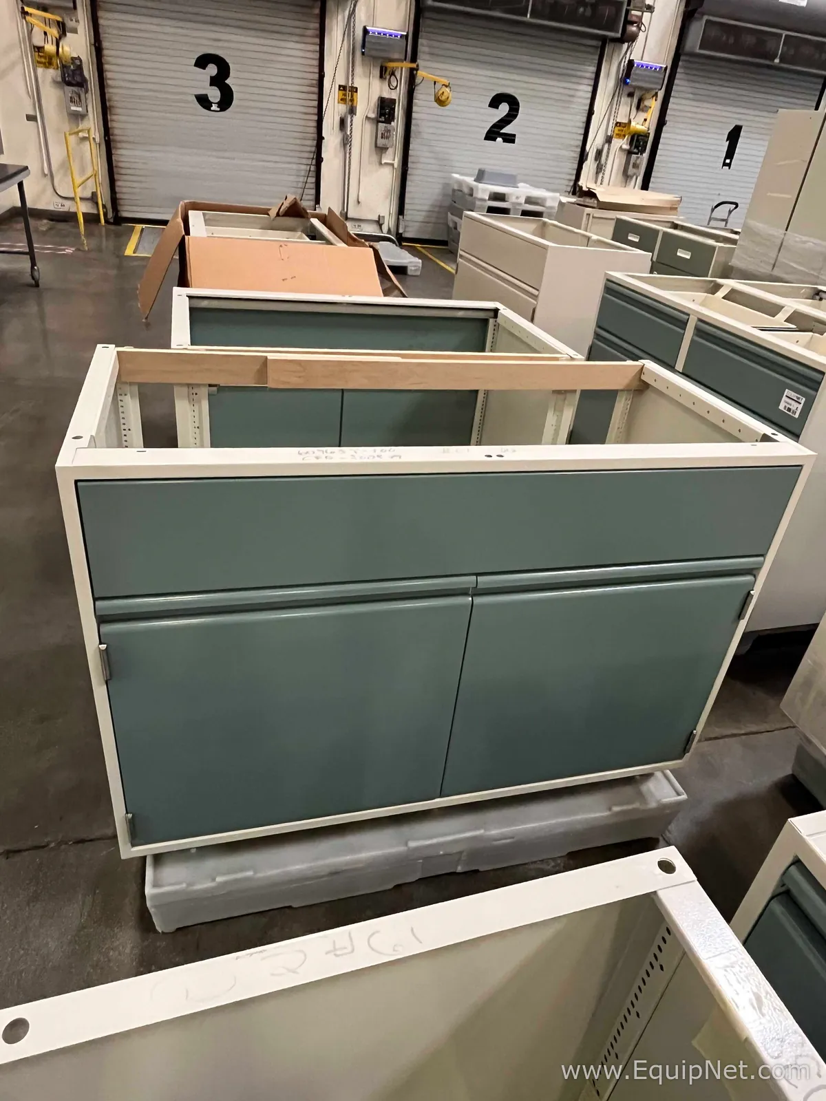 Lot of Lab Storage Counters and Cabinets, Agave and Light Neutral Colors and one pump