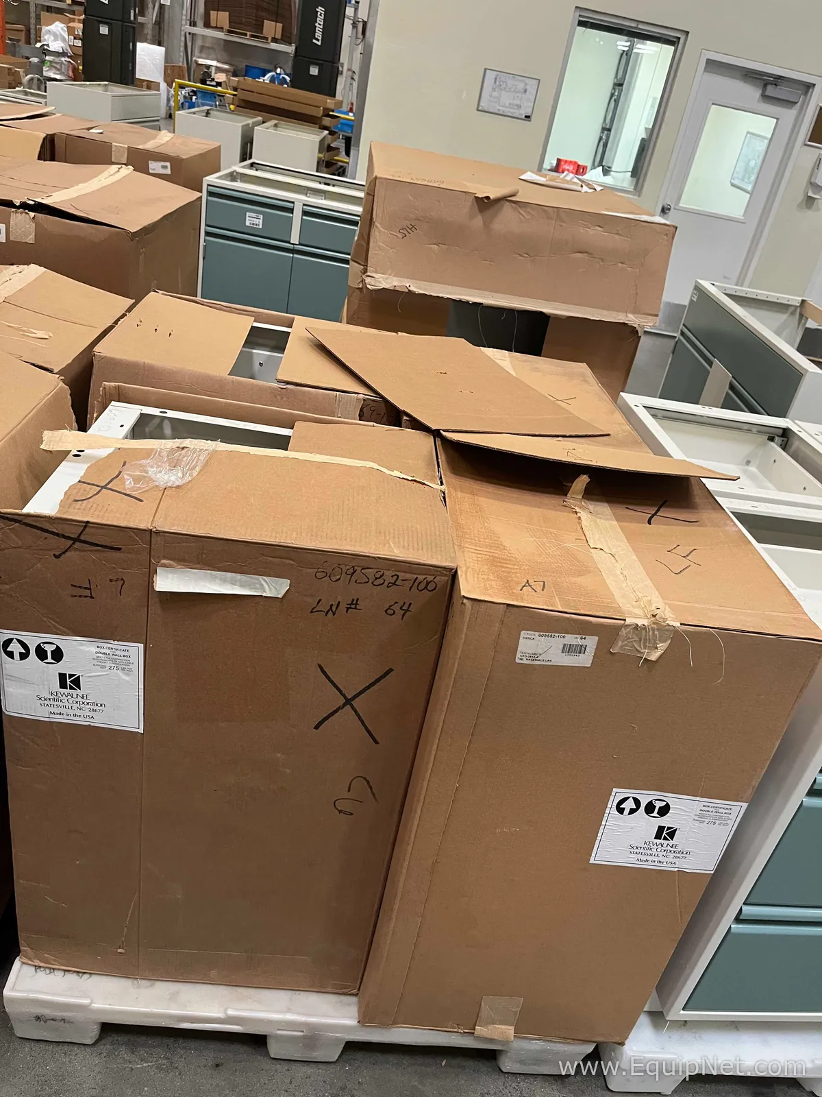 Lot of Lab Storage Counters and Cabinets, Agave and Light Neutral Colors and one pump