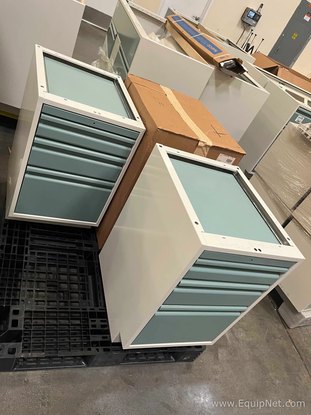 Lot of Lab Storage Counters and Cabinets, Agave and Light Neutral Colors and one pump