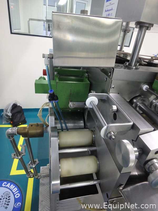 Maquina Encapsuladora de Capsula Suave marca STC modelo RGY6-15S con Equipos Perifericos