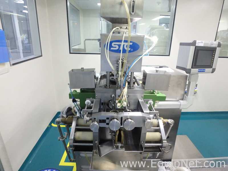 Maquina Encapsuladora de Capsula Suave marca STC modelo RGY6-15S con Equipos Perifericos