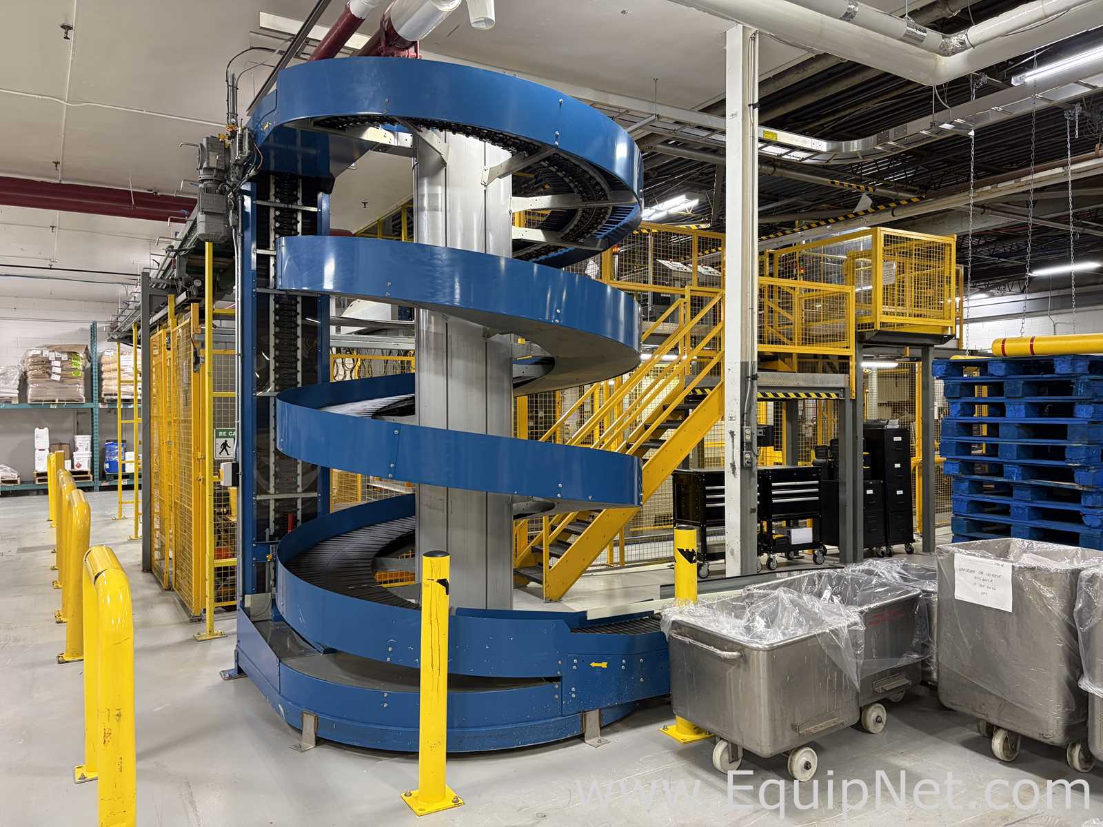 Dual Columbia HL 2000 Palletizers with Wulftec Pallet Wrapper and Ryson Spiral Case Conveyor