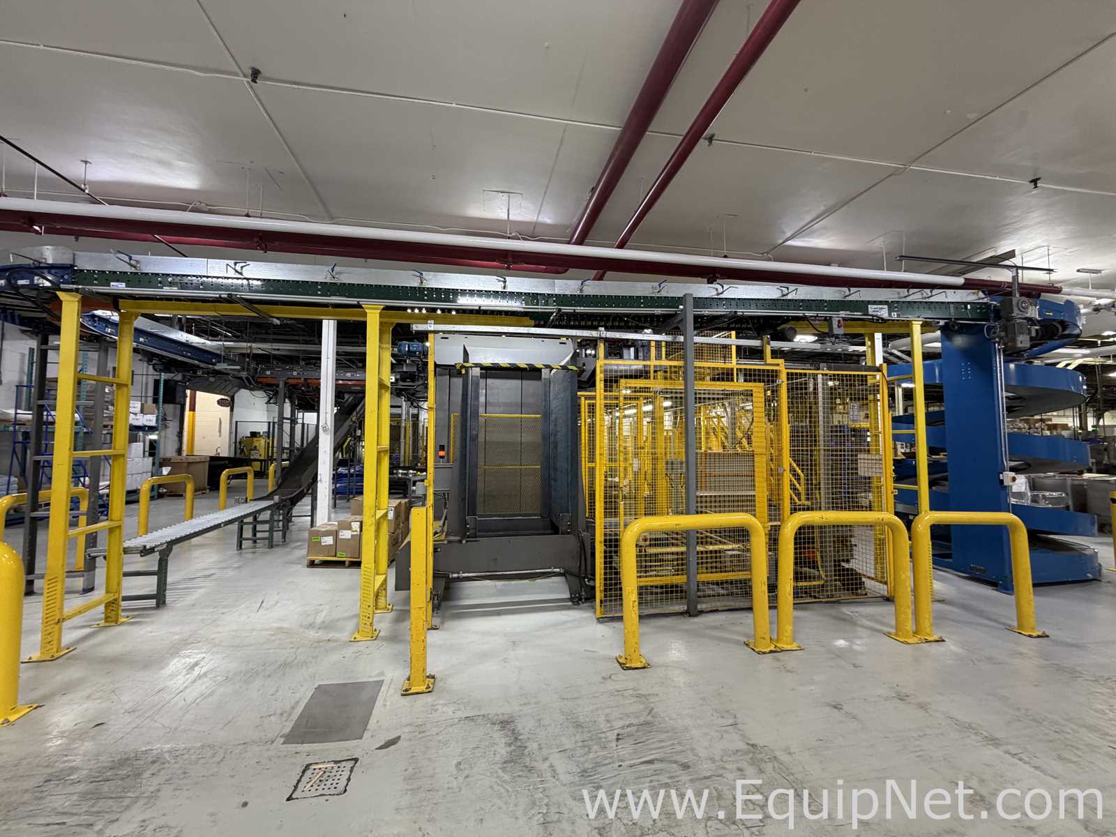 Dual Columbia HL 2000 Palletizers with Wulftec Pallet Wrapper and Ryson Spiral Case Conveyor