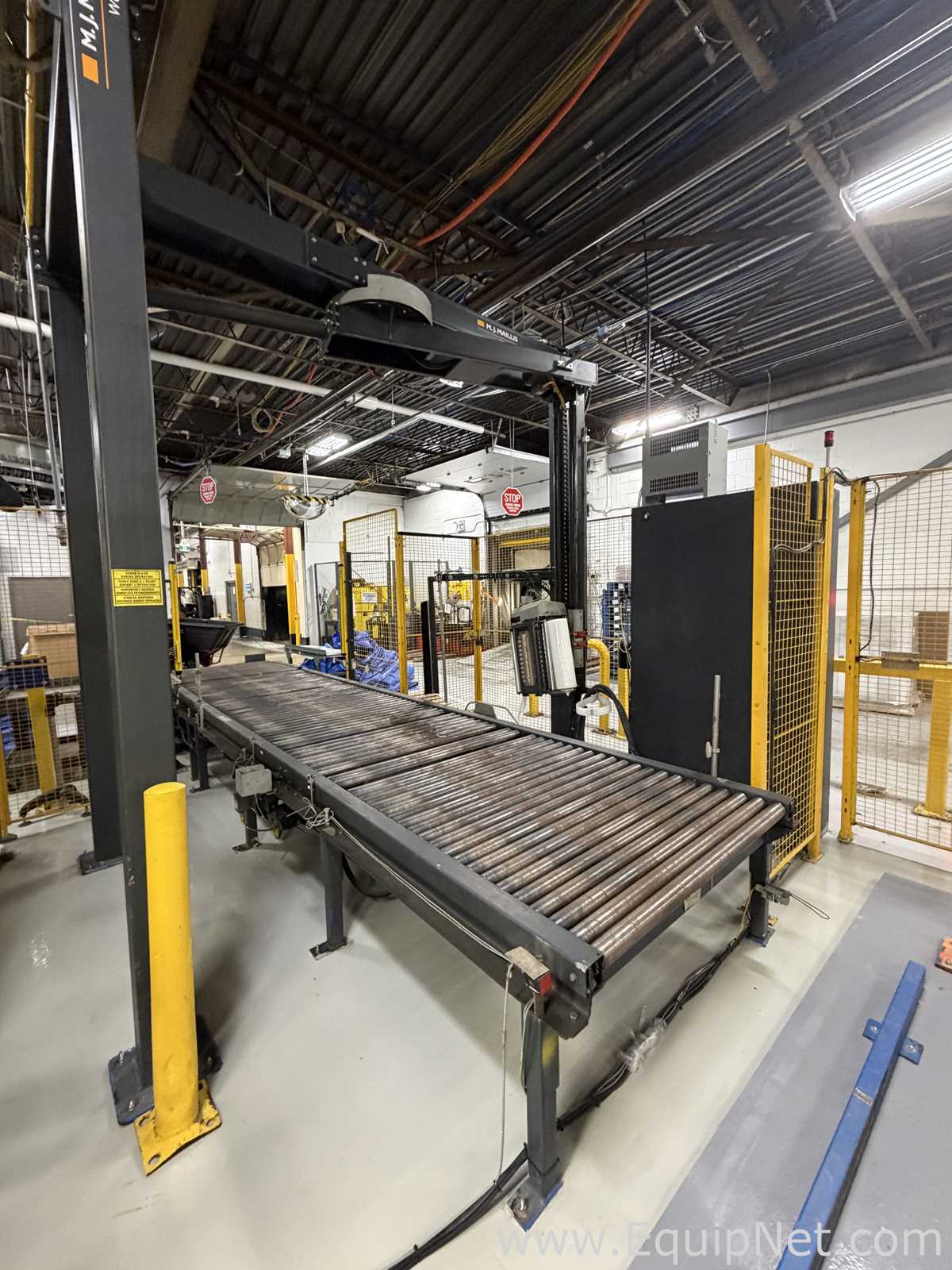 Dual Columbia HL 2000 Palletizers with Wulftec Pallet Wrapper and Ryson Spiral Case Conveyor
